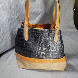 Black and Brown with tan medium purse